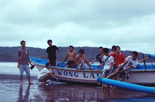 Kapal nelayan yang terparkir di bibir Pantai Pangandaran.