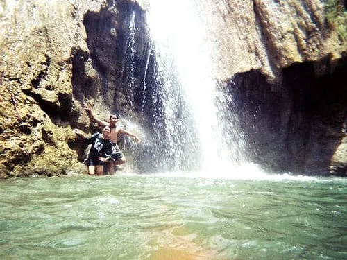 Berenang, menegak kesegaran air curug.
